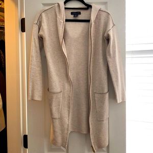 Hooded cream cardigan with golf zipper